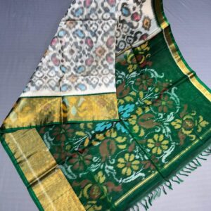 Ikat silk cotton saree white and bottle green with allover ikat weaves and long zari woven ikat border
