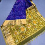 Ikat silk cotton saree Blue and parret green with allover ikat weaves and long zari woven ikat border